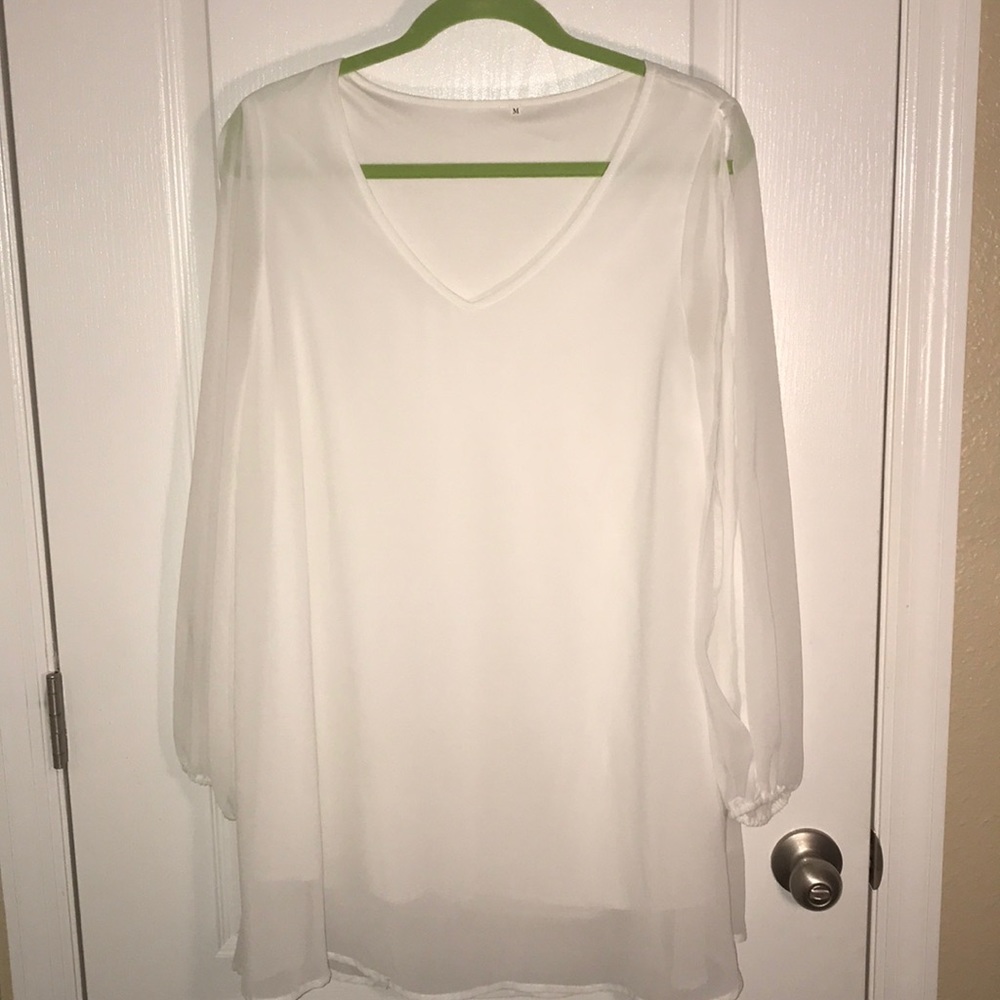 White long sleeve shirt dress.